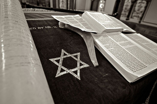 Star of David and religious texts laid out in a synagogue