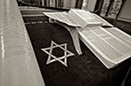 Star of David and religious texts laid out in a synagogue