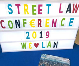Banner and LAC flyer at Street Law event