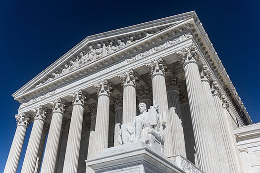 US Supreme Court Building against a blue sky