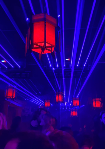Photo: Mirage Paris nightclub with blue and red neon lights