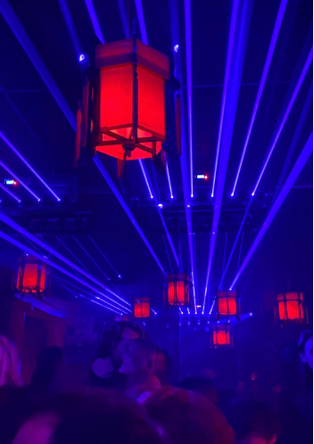 Photo from the nightclub Mirage Paris with blue and red neon lights