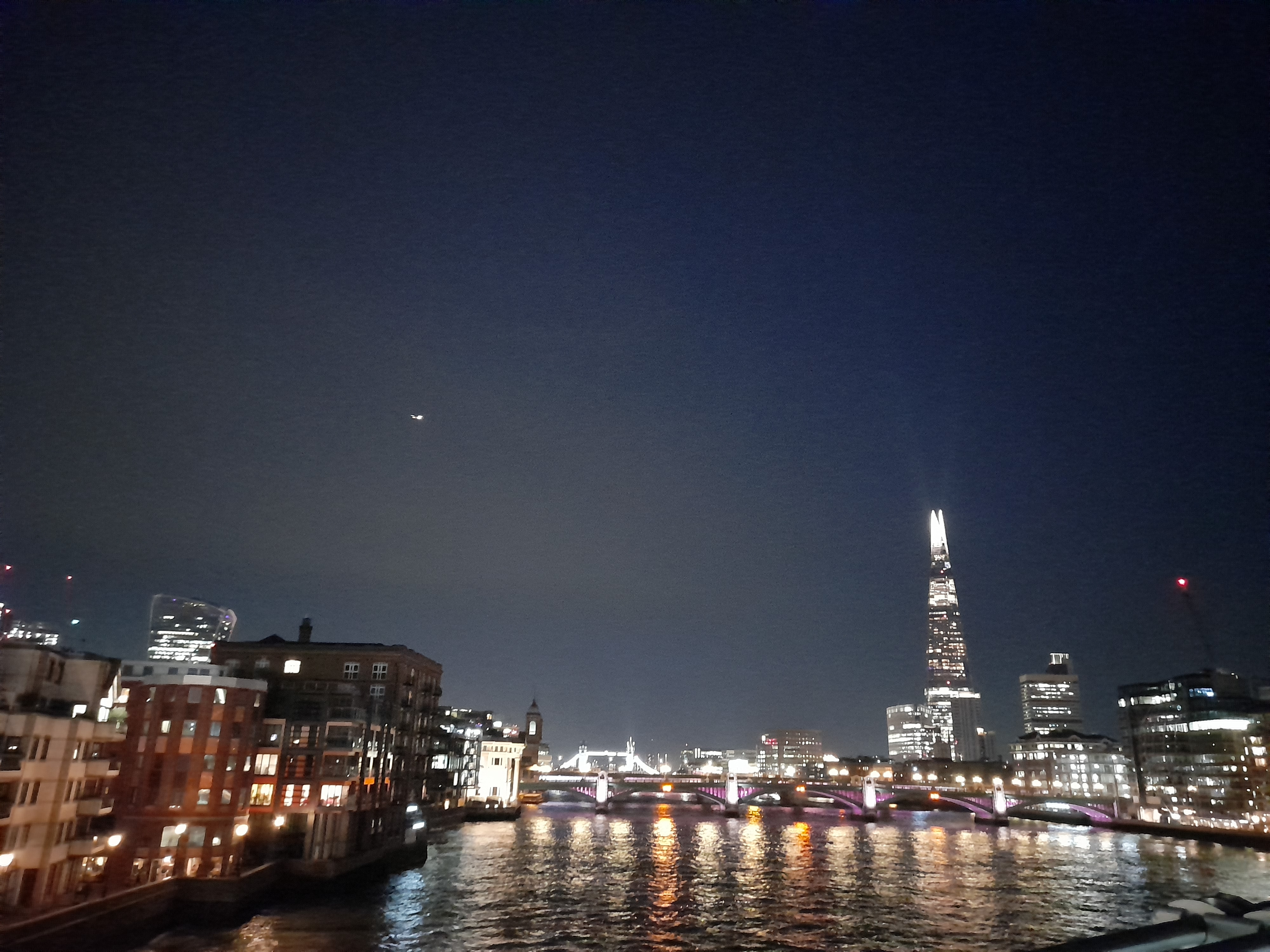 River Thames at night with the Shard showing on the background