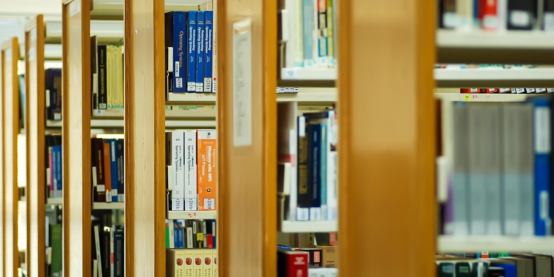 A picture of some bays of shelving in a library