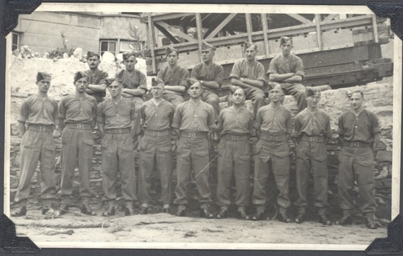 Two rows of men in army uniform in the 1940s