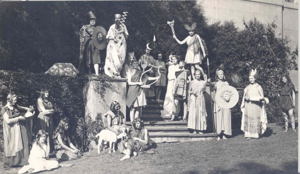 Black and white photograph of women students dressed in Greek mythological costume for a drama performance