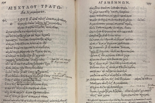 Two pages of book with text of Agamemnon in greek.