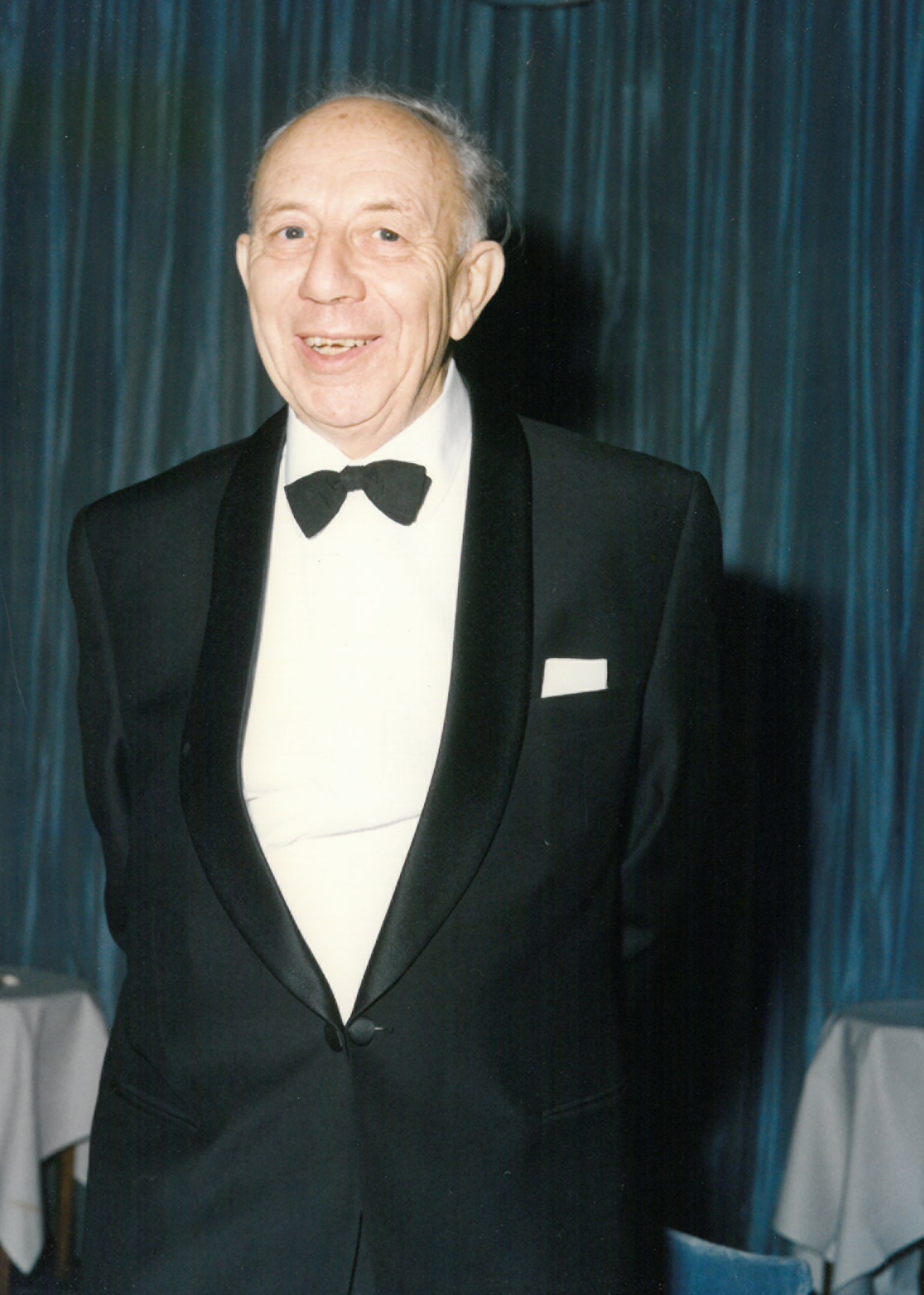 Photograph of Donald Chesworth in a dinner suit and bow tie