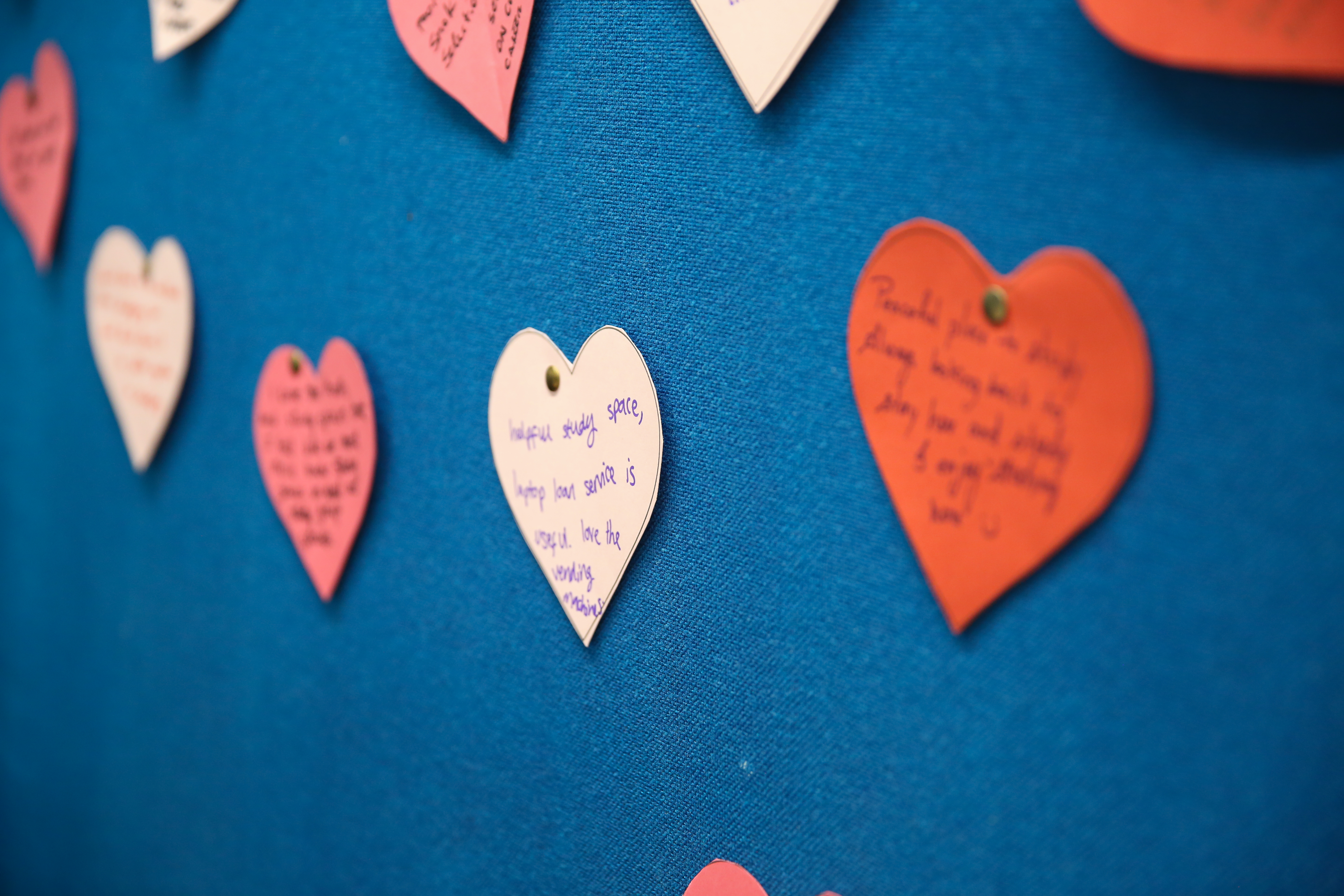 Love hearts on a felt board with text