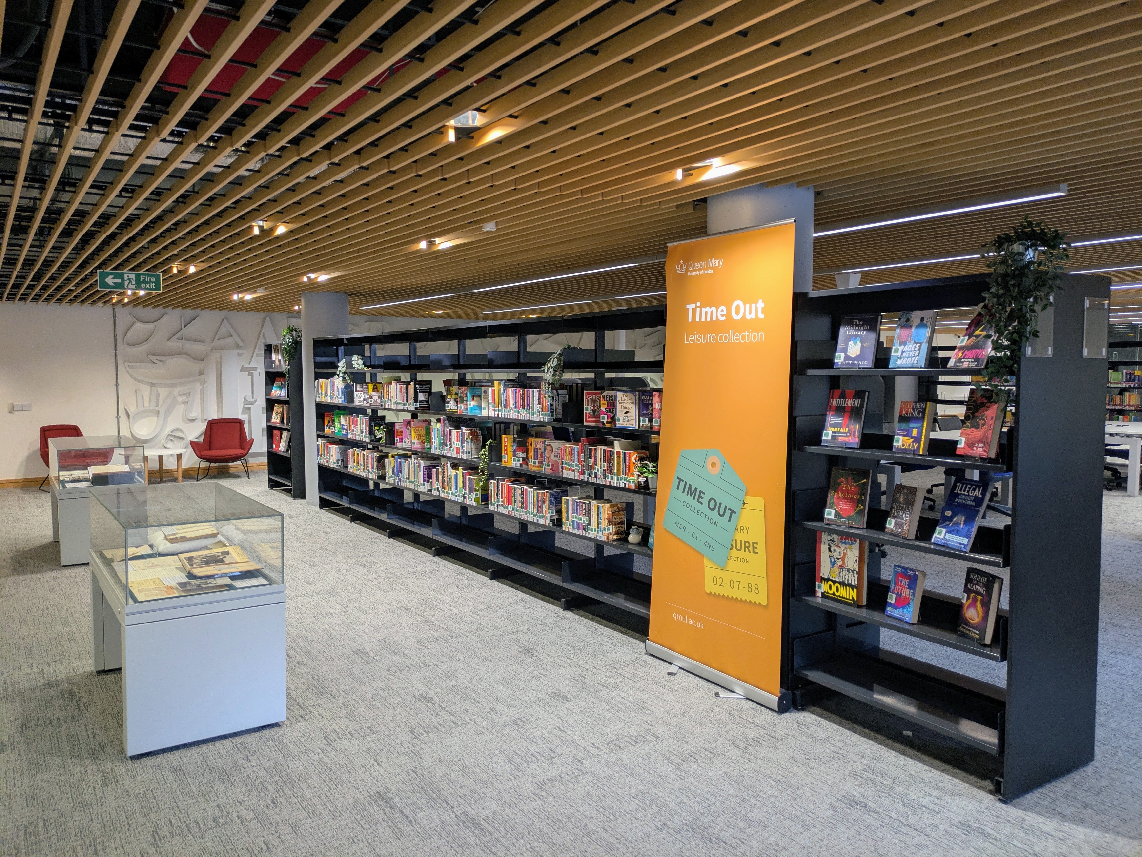 Bookshelves containing books from the Time Out leisure reading collection