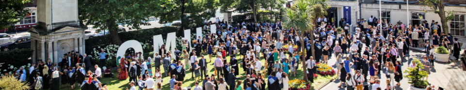 students in the garden in front of people's palace party atmosphere