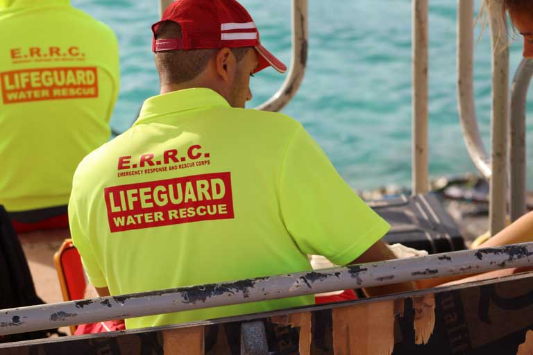 A male ERRC lifeguard seen from the back