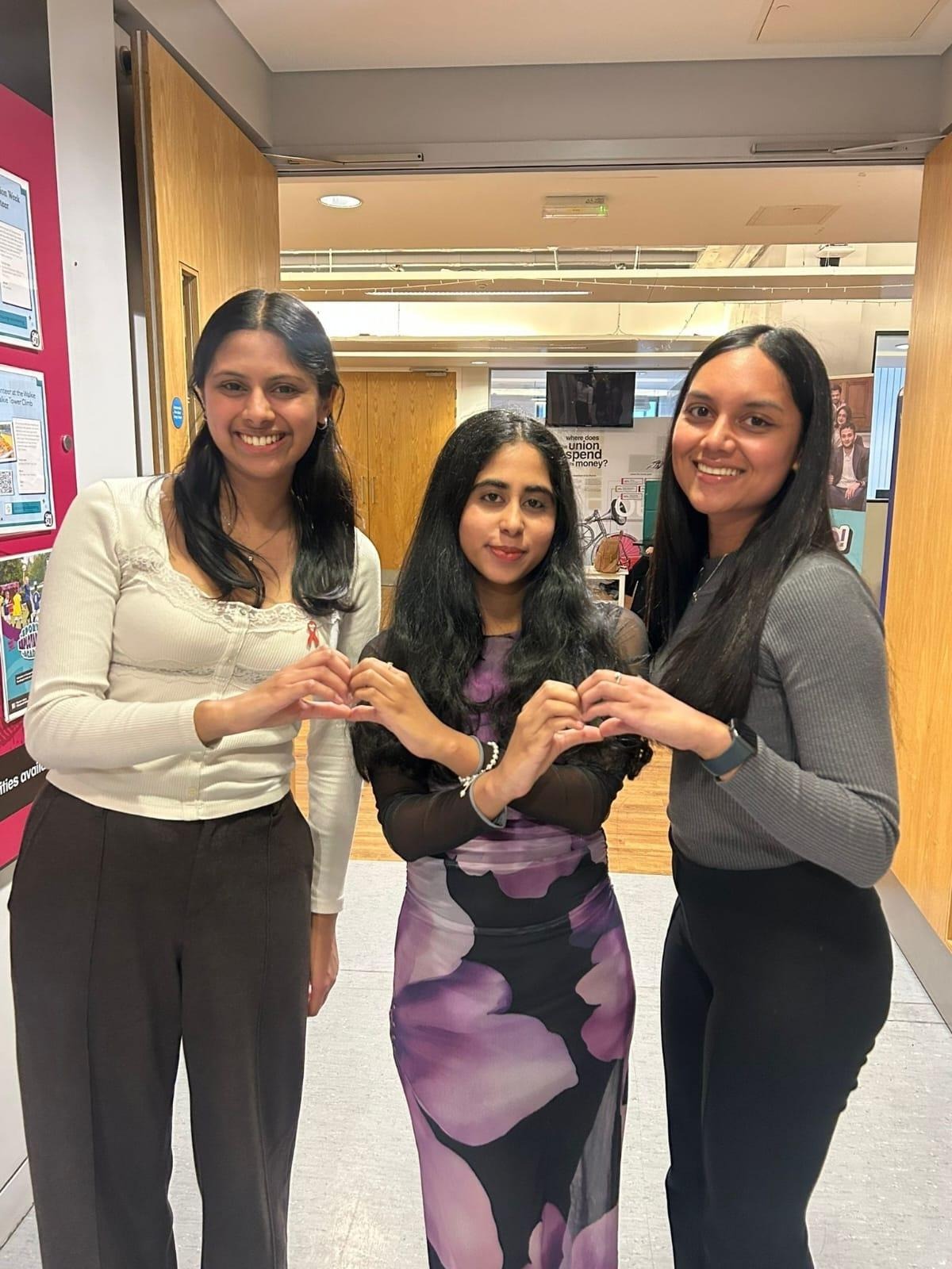 An image of Madhura (BL Womens rep), Diya (President) and Divyani (BL Womens rep)