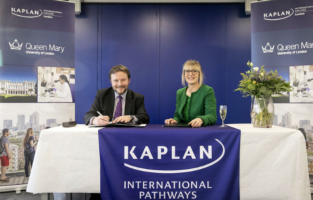 Professor Colin Grant, Vice Principal (International) at Queen Mary and Linda Cowan, Managing Director of Kaplan International Pathways, sign the agreement at Kaplan International College London.