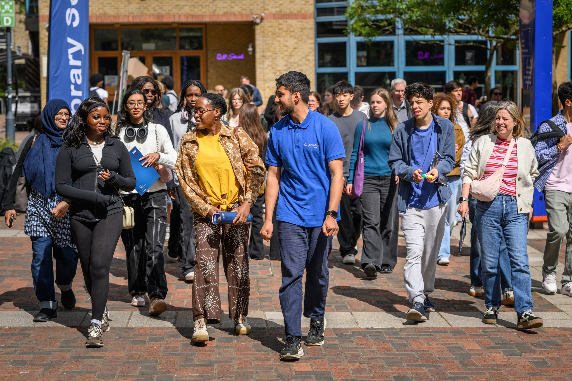 student ambassador leading campus tours on open day