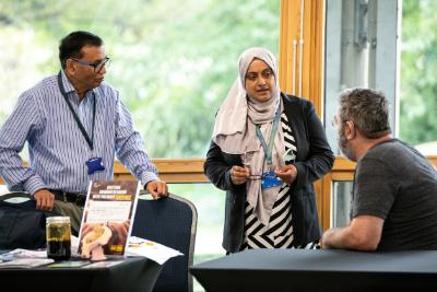 People speaking around a table