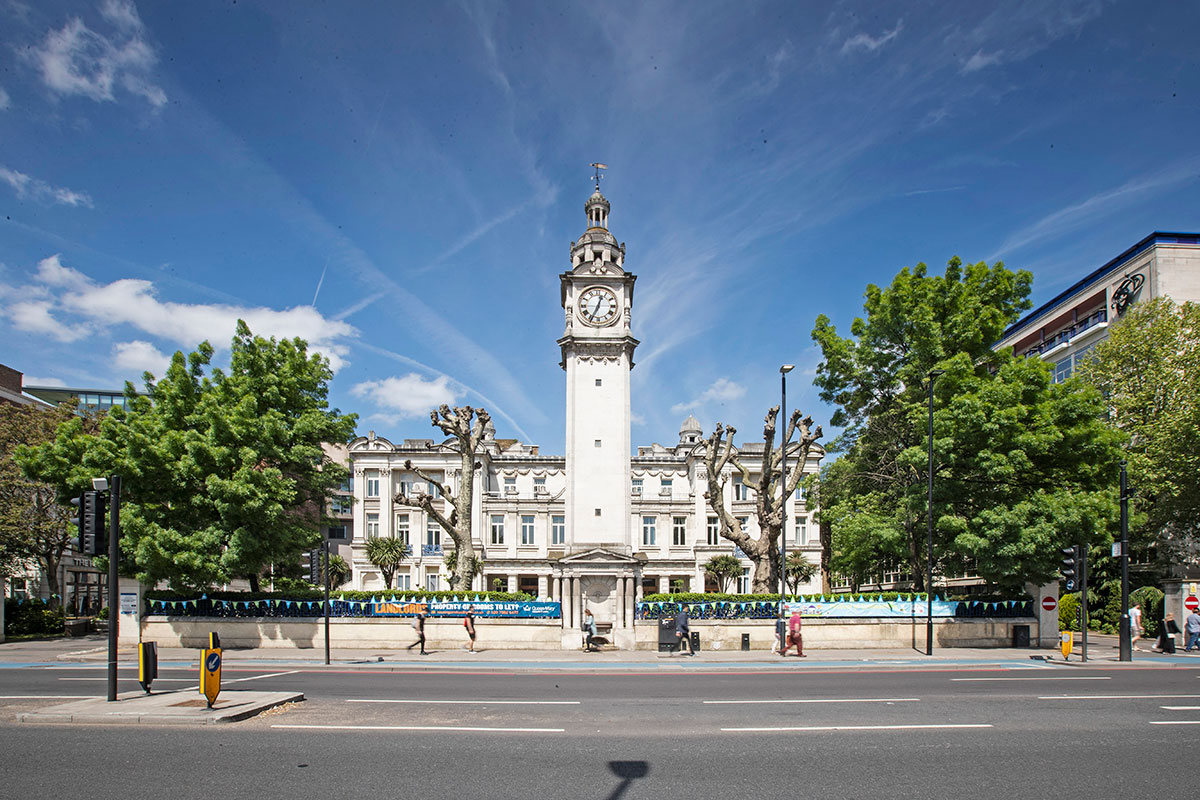 The clock tower and Queens building at the front of the Queen Mary University of London's Mile End campus