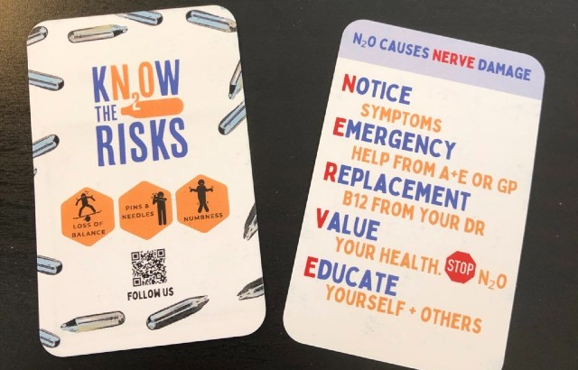 Cards outlining the risks of nitrous oxide use