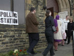 People entering a polling station