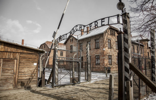 A photograph of the entrance to the Auschwitz concentration camp