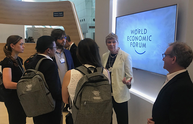 Professor Fran Balkwill speaking to guests at World Economic Forum