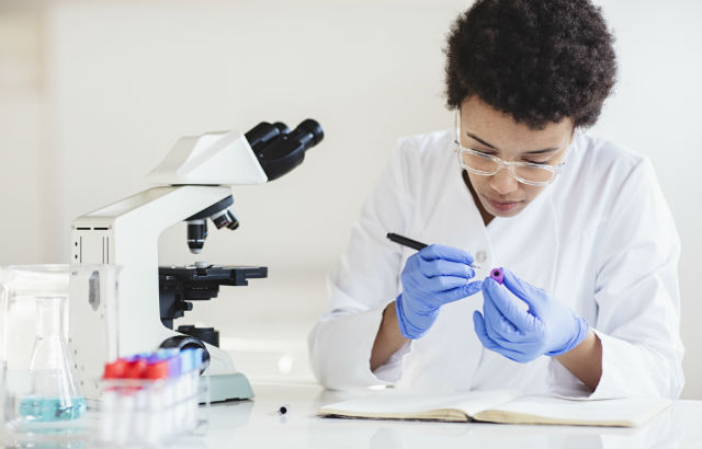 Scientist analysing a blood test 