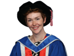 Picture of Elf in blue graduation gown and black felt graduation hat