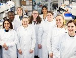 Group of Female Researchers in Lab Coats at the Blizard Institute