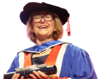 Picture of Moira in blue graduation gown and black felt graduation hat