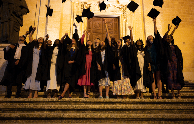 Students celebrating their graduation from the MBBS programme at Queen Mary's Malta campus
