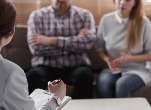 Couple speaking to a therapist. Credit: iStock.com