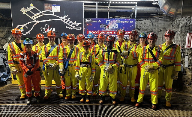 The participants at the entrance to the laboratory 2.1 kilometers underground in a nickel mine on Wednesday morning (about +30°C at that depth). Credit by: SNOLAB.