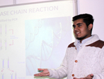 Fahim Ali, a Year 13 student taking part in the project, presents the group's work