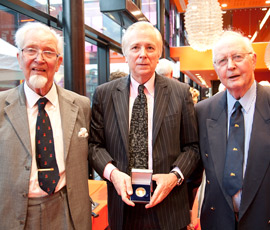 Professor Andrew Lees - centre - with Lord Brain's sons