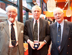 Professor Andrew Lees - centre - with Lord Brain's sons