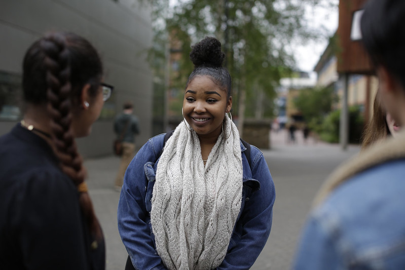 Students discussing the Buddy Scheme