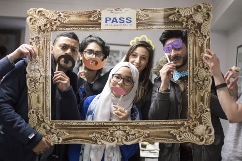 Peer Assisted Study Support - Students holding up a frame