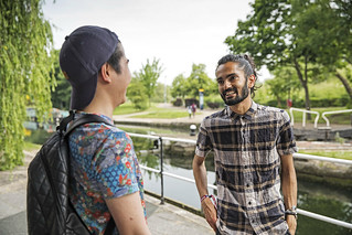 Two students talking about the Buddy Scheme