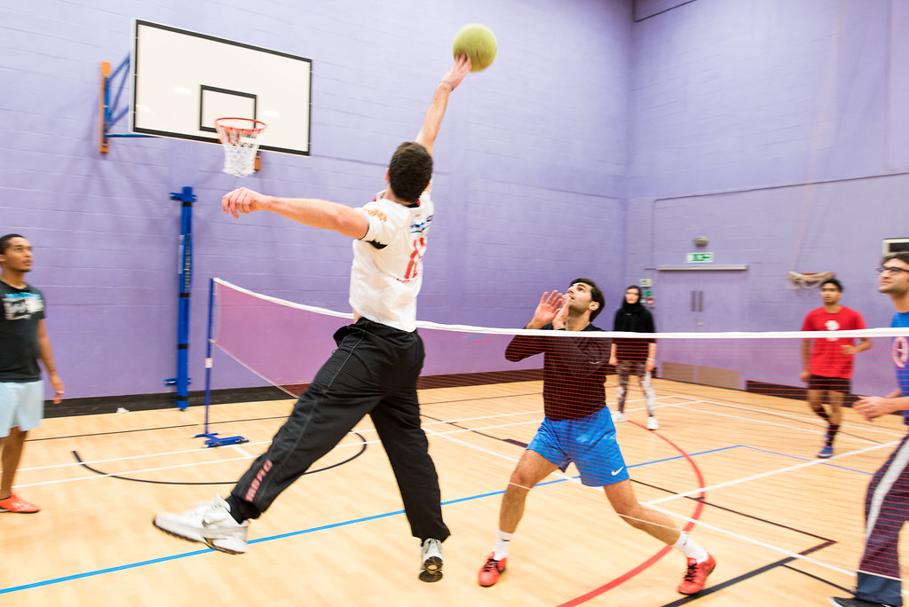 students playing volleyball