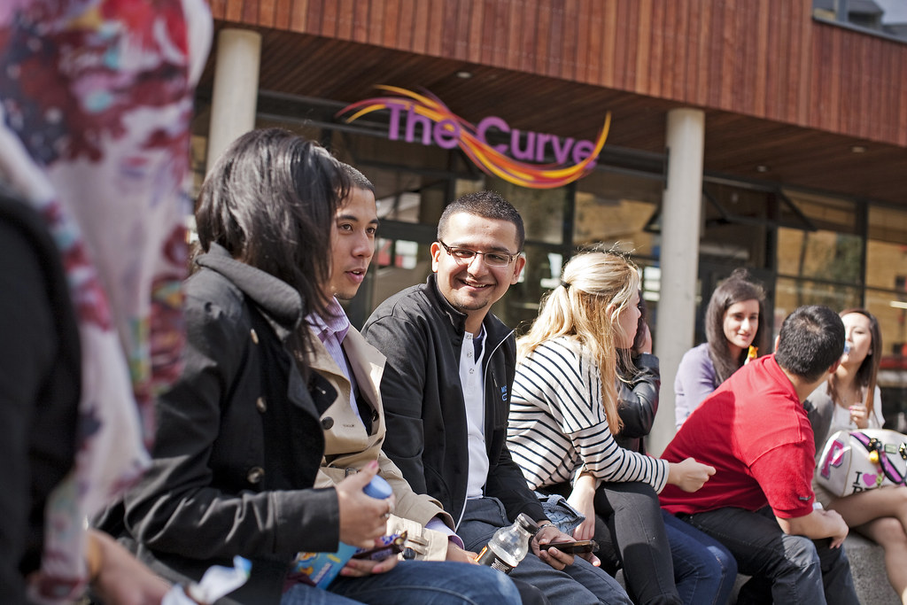 Students sitting outside the curve