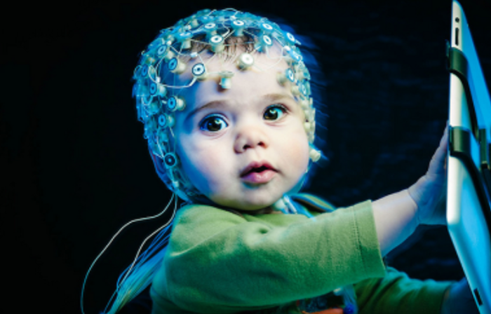 A baby using a tablet