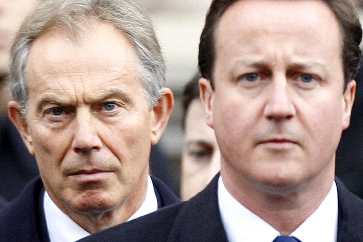 Photo of David Cameron appearing at a Remembrance Day service at the Cenotaph with Tony Blair over his shoulder