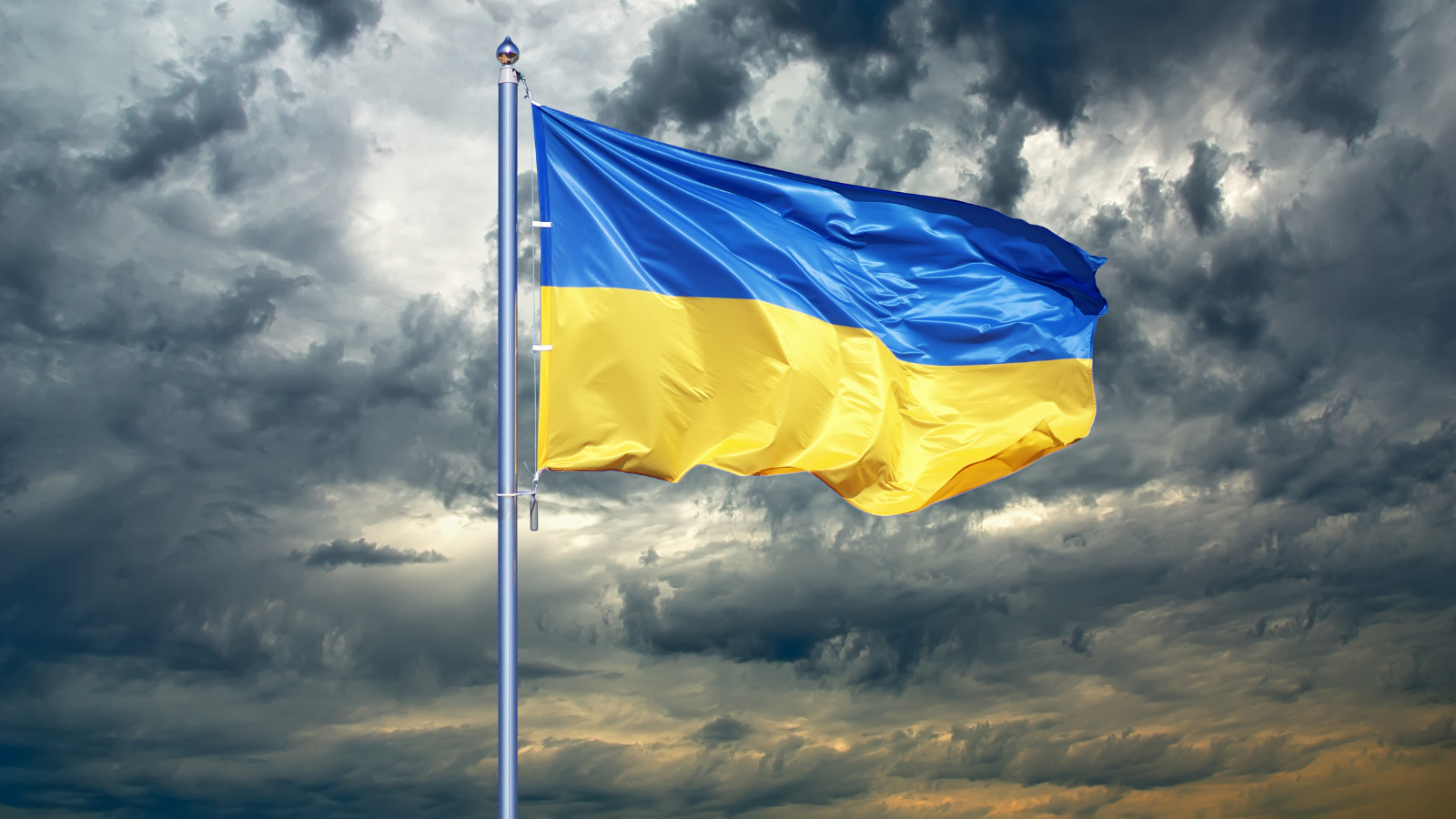 Photo of Ukrainian Flag against Grey Clouds
