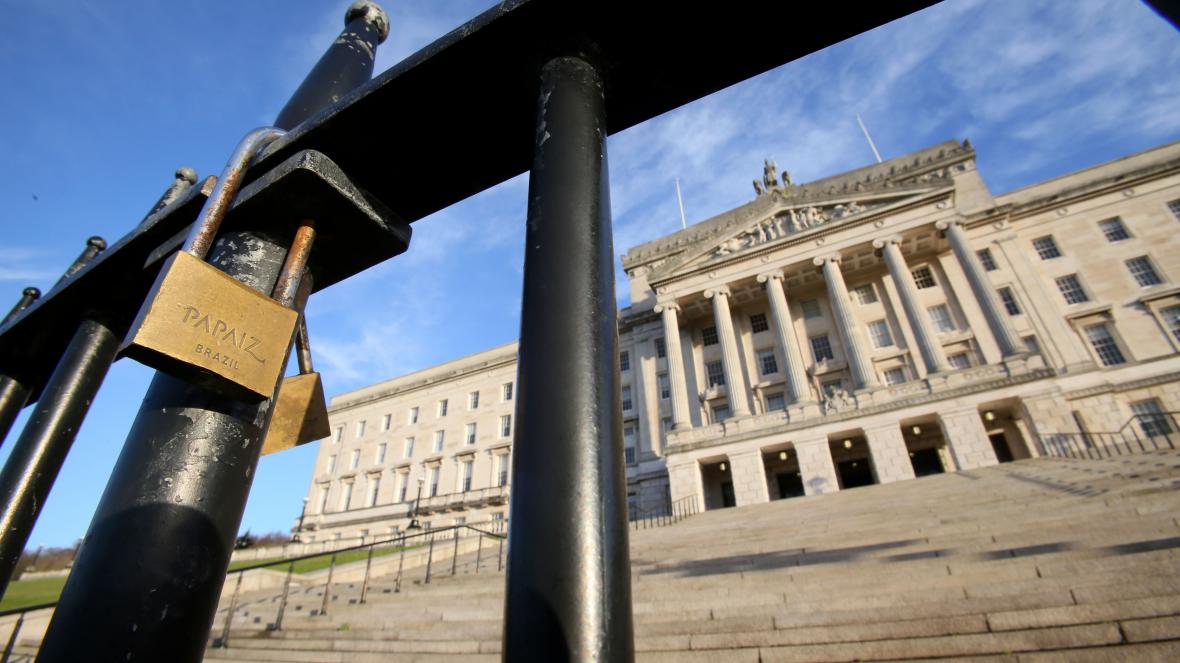 Photo of Stormont Parliament with its main gate padlocked during the breakdown of devolution in Northern Ireland