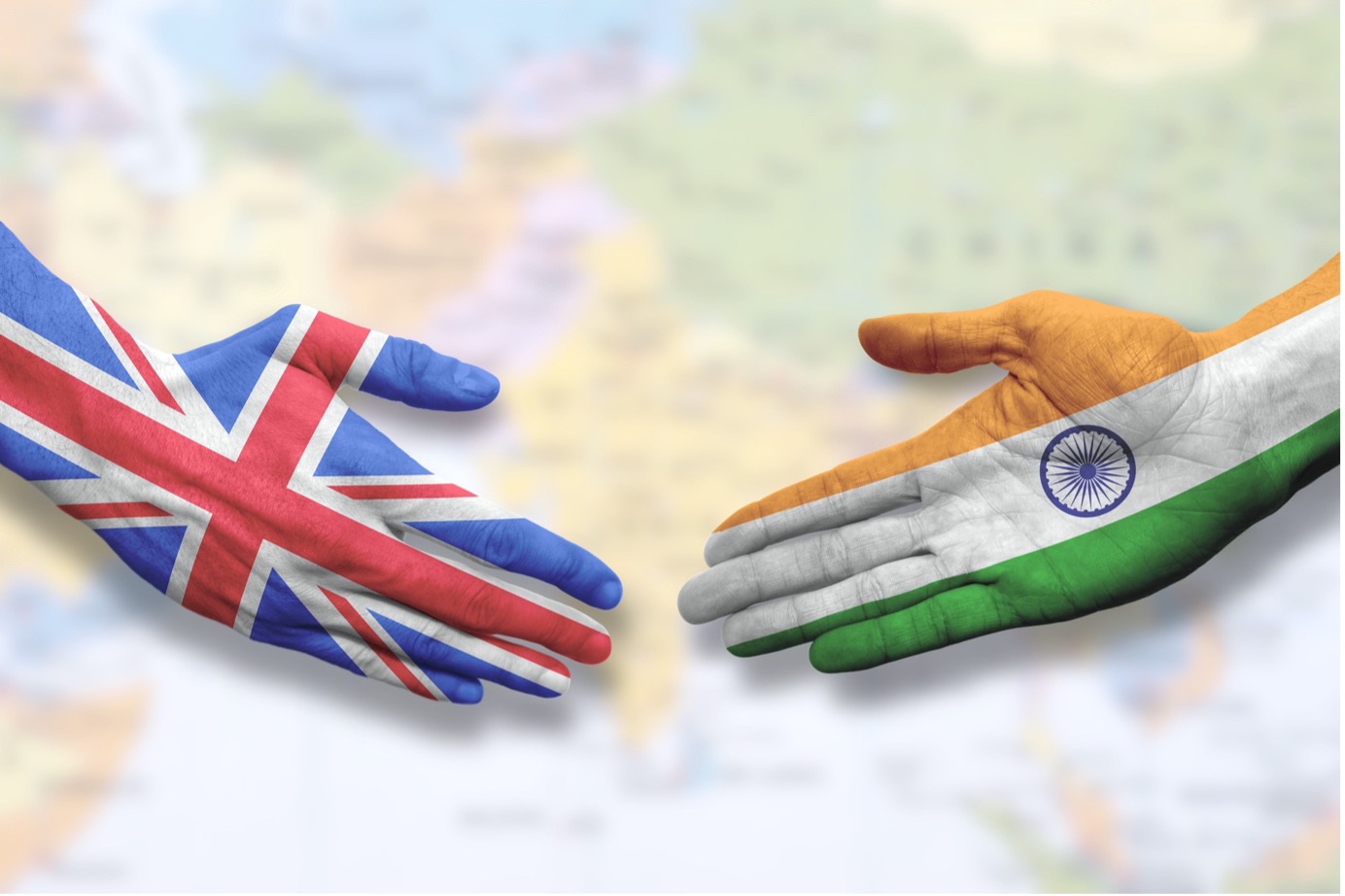 India and UK - Flag handshake symbolizing partnership and cooperation with the United Kingdom stock photo