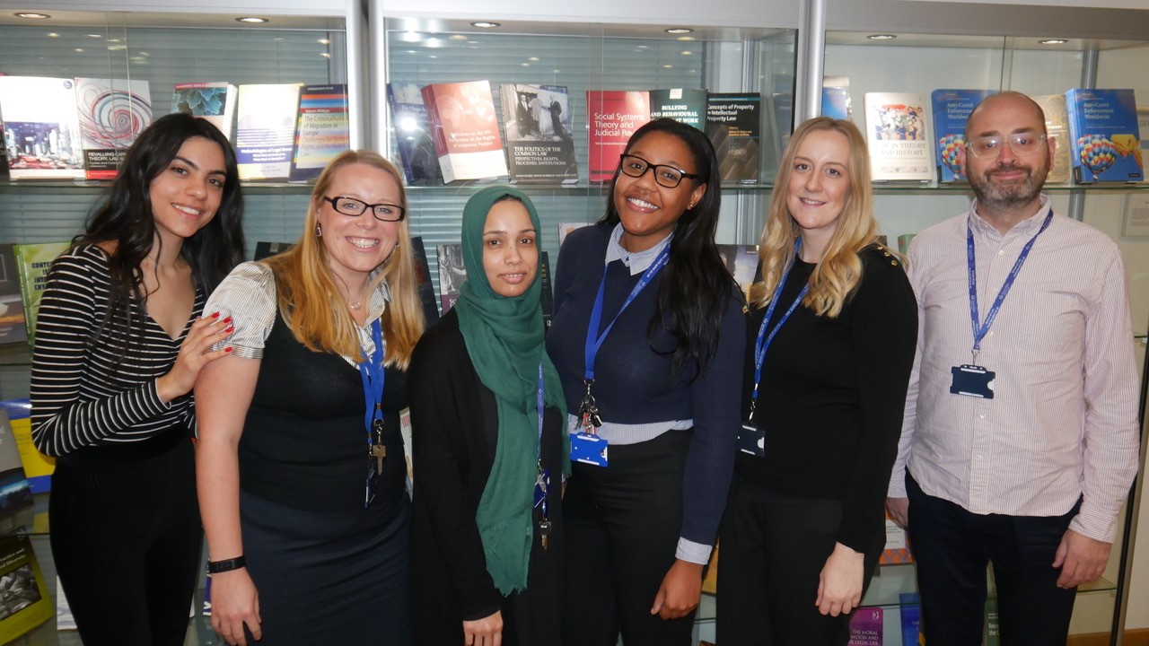 A group photo of Queen Mary staff and students from the Legal Advice Centre