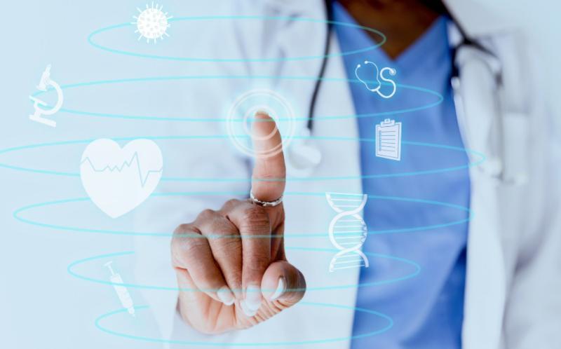A female doctor touches a device screen, which is overlaid on the photo. The icons in the photo are a heartbeat, microscope, genome, medical chart.
