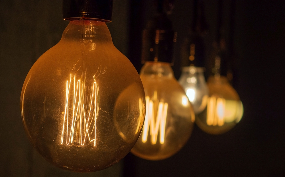 An image of four filament lightbulbs