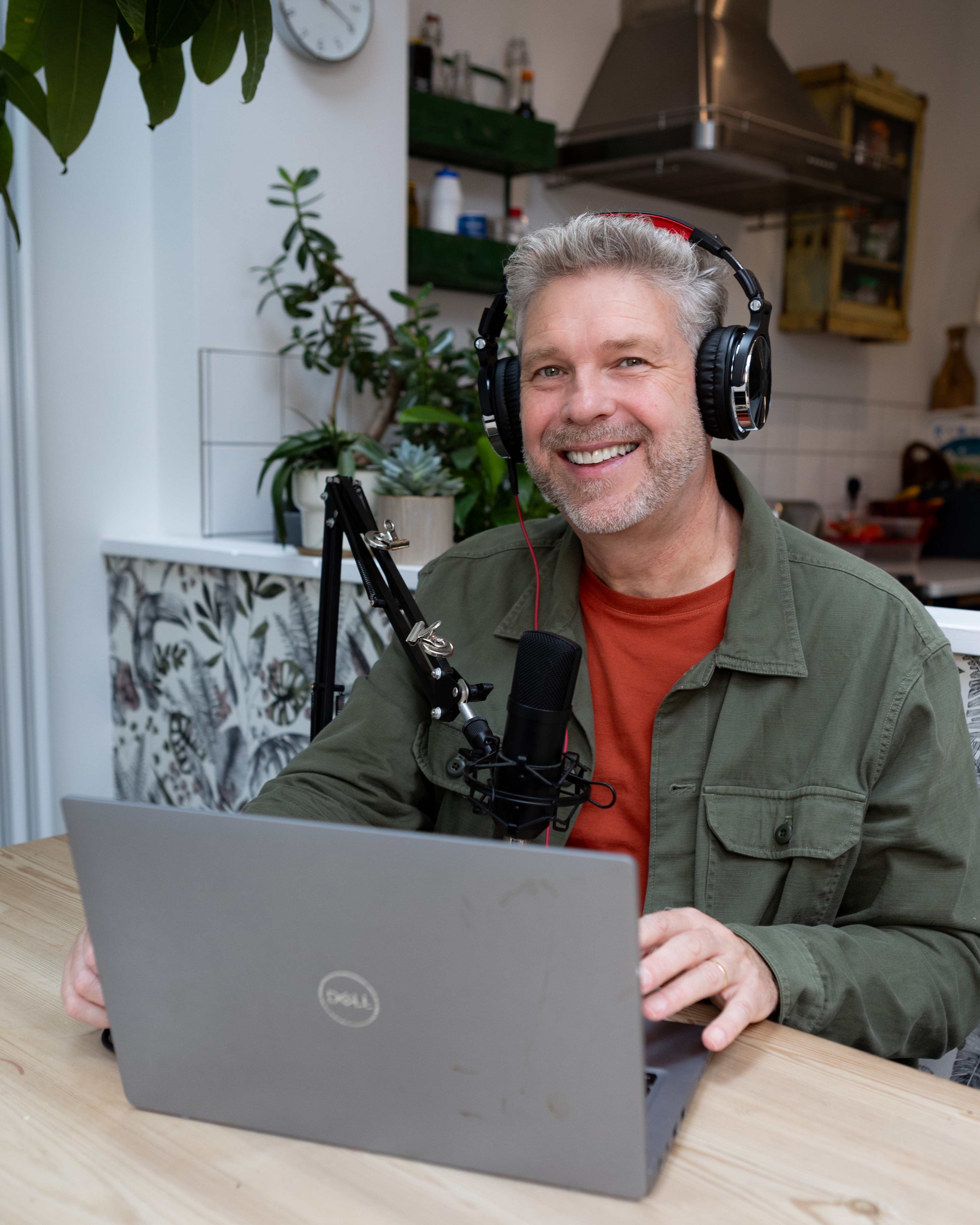 Profile photo of Professor Graham Easton with laptop and headset