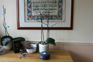 Religion at home, desk with prayer poster